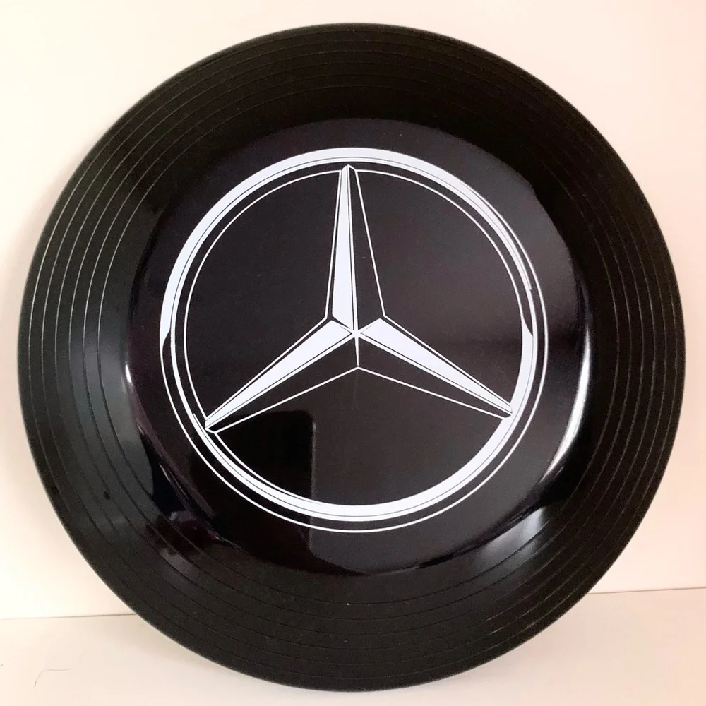 Hold Mercedes Benz frisbee
